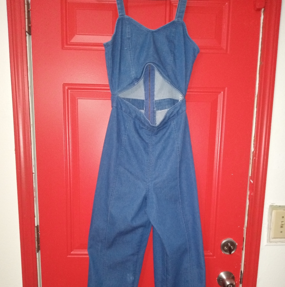 A medium blue Derek Heart jumpsuit.